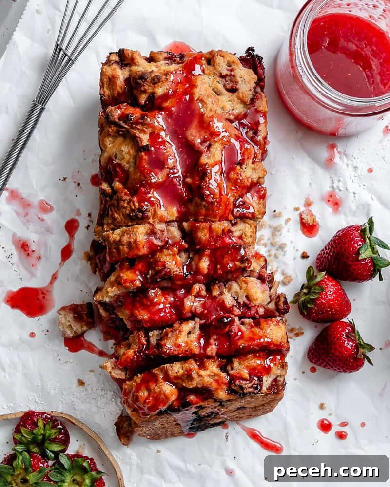 completed Easy Strawberry Bread on white surface