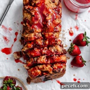 completed Easy Strawberry Bread on white surface