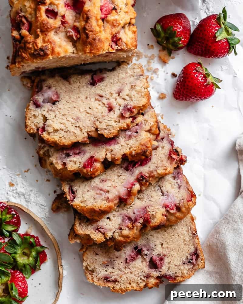completed Easy Strawberry Bread on white surface
