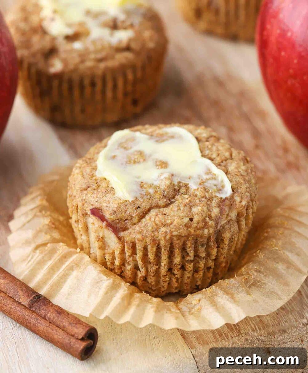 Buttered muffin in a muffin wrapper.