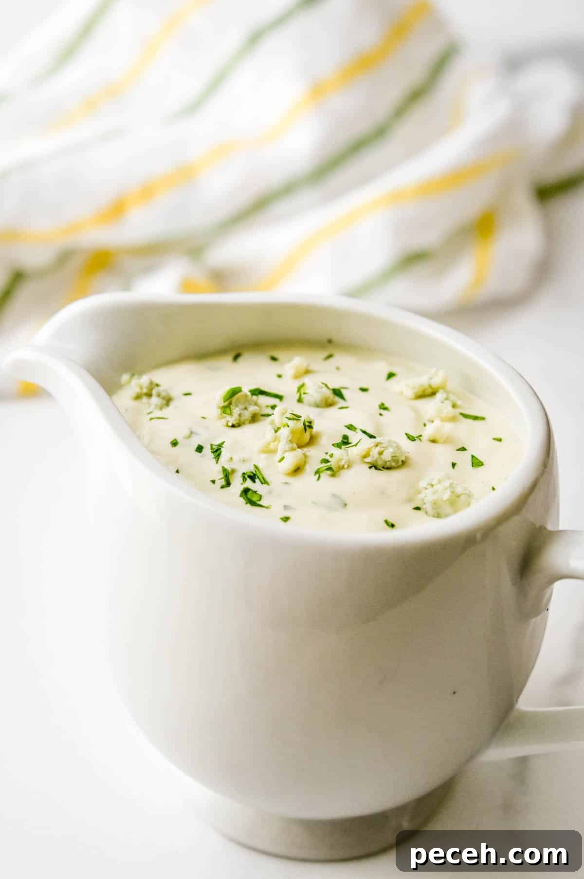 Creamy Chunky Blue Cheese Dressing Recipe 6 Serving the dressing in a mini pitcher.