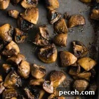 Quick Oven-Roasted Mushrooms with Garlic and Herbs 8 Quick and easy roasted mushrooms recipe. Perfect healthy side dish! #sidedish #roastedmushrooms #vegan #meatless #mushrooms #dinner #vegetables