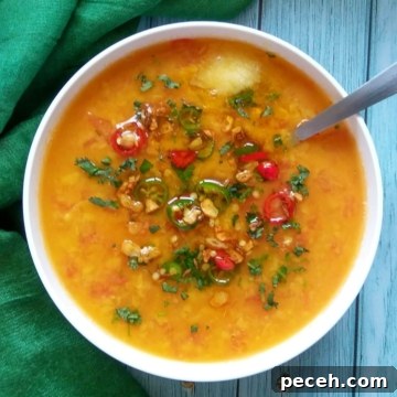 Arhar dal in a white bowl.