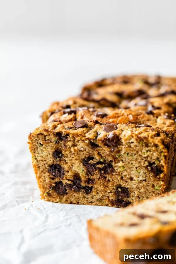 Moist Butternut Squash Loaf Recipe for Fall Baking 12 sliced chocolate chip bread on parchment paper