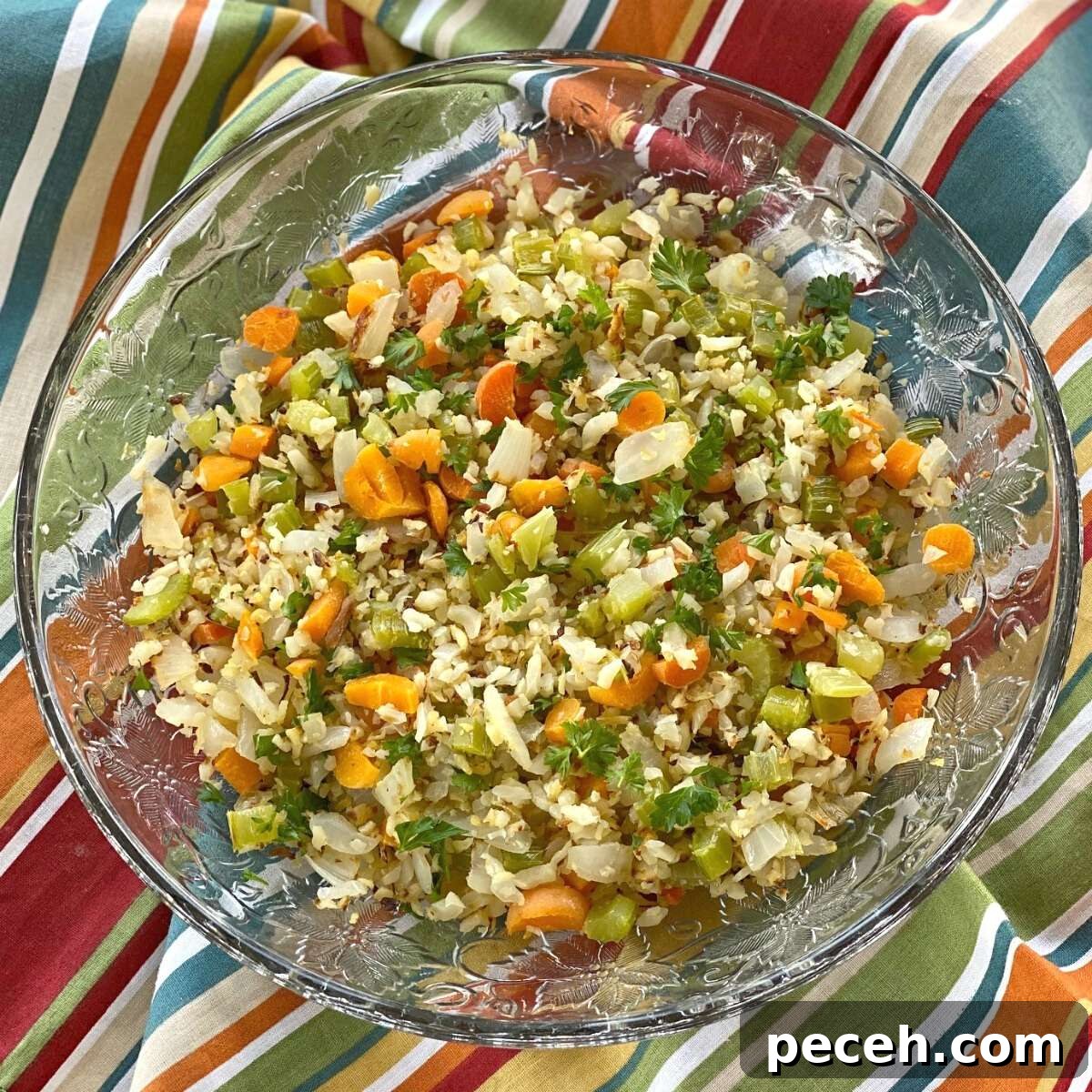 cauliflower rice pilaf with vegetables in a bowl.C