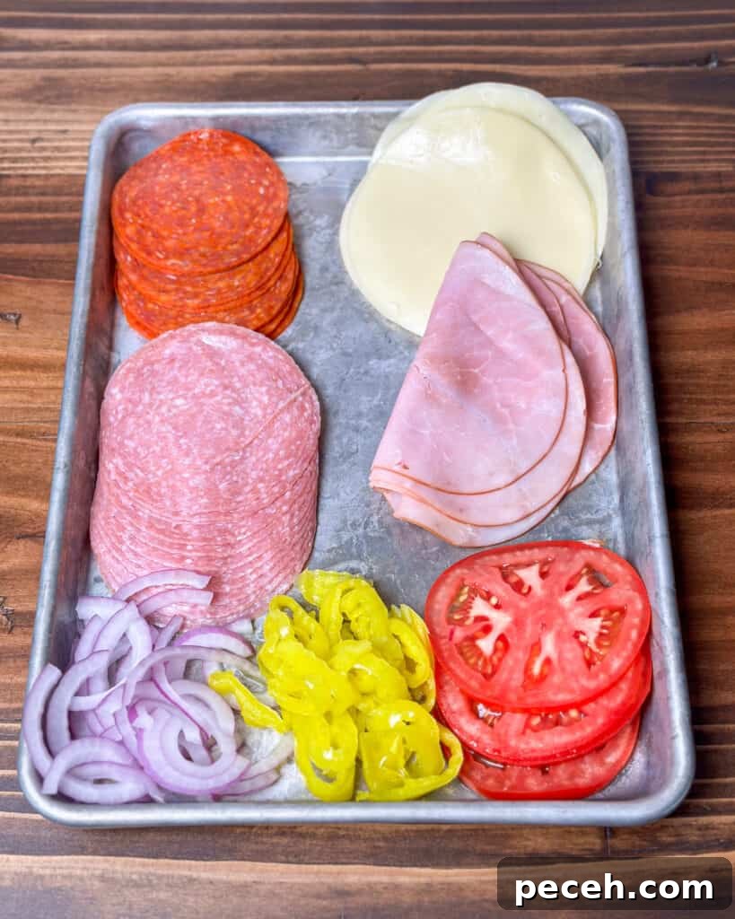 Meats, cheese and veggies for an Italian sandwich