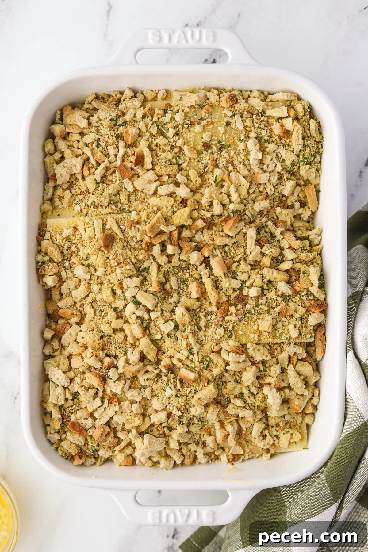 Creamy Swiss-Style Chicken Casserole with Mushrooms and Cheese 10 A baking dish casserole topped with stuffing mix.