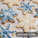 Snowflake Sugar Cookies: Festive Icing & Decorating Guide 10 Close up shot of some snowflake cookies cropped square.