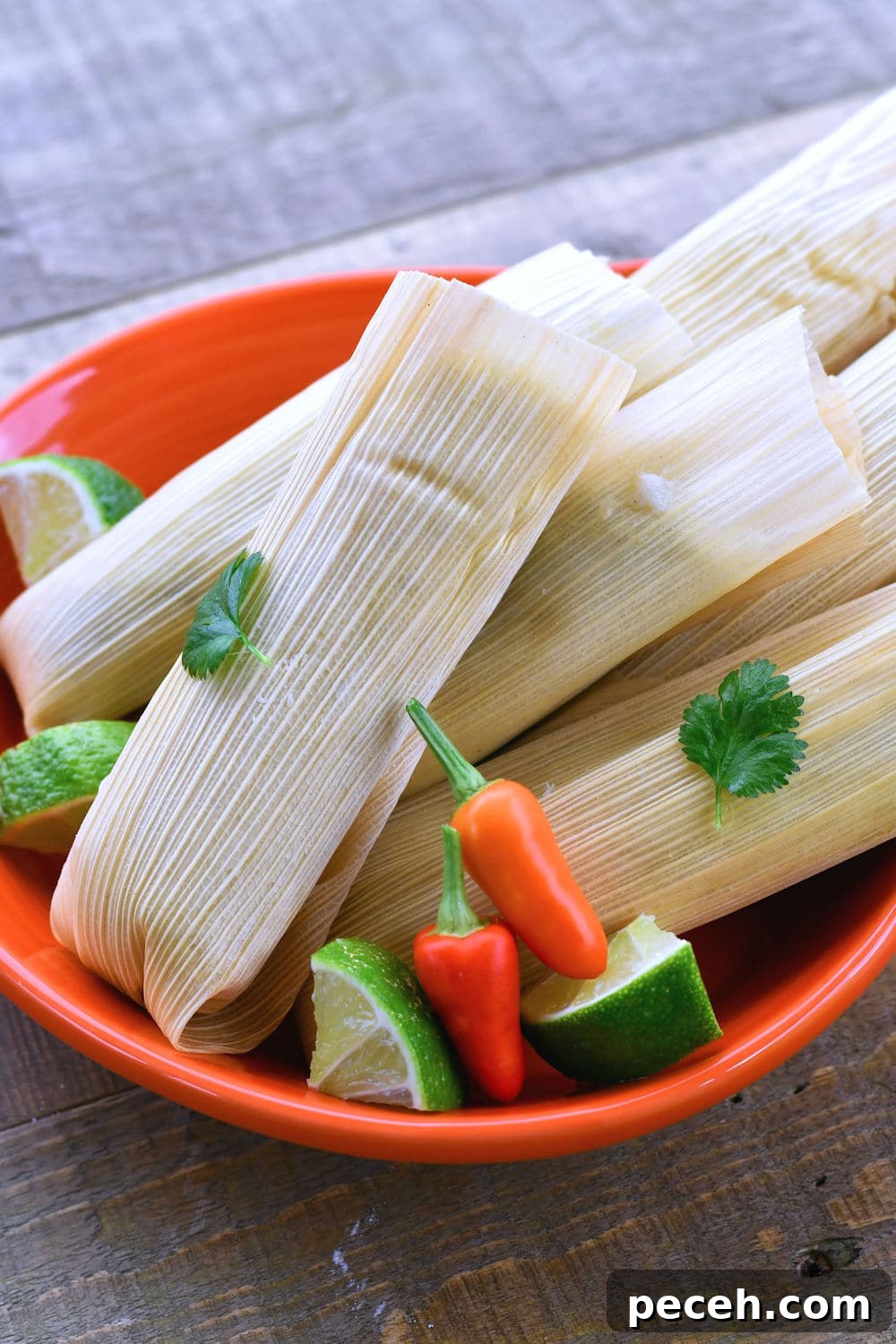 finished chicken tamales in a stone serving dish.