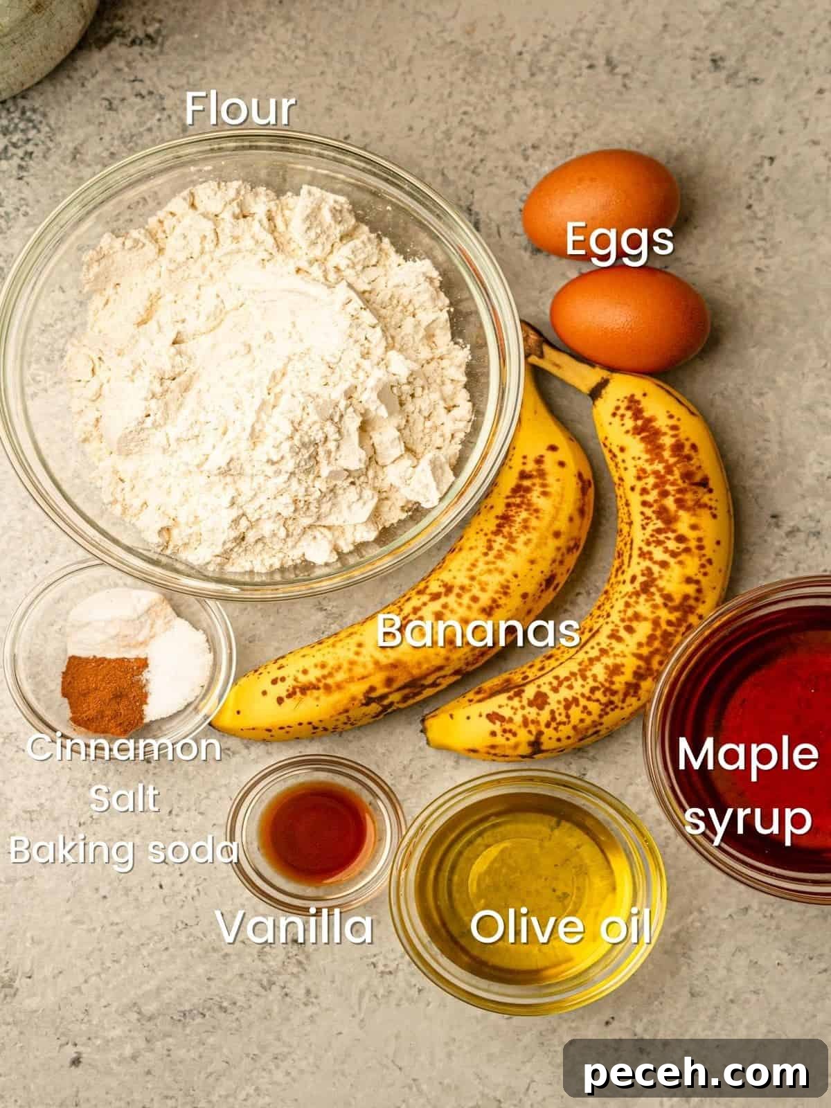 Ingredients in bowls on a gray surface.