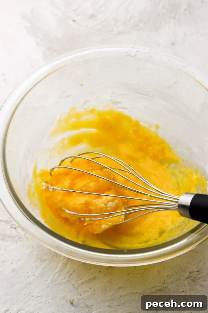 Light and Fluffy Banana Pudding Cake Recipe 4 egg yolks whisked with sugar and cornstarch, still clumpy