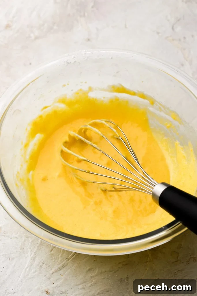 Light and Fluffy Banana Pudding Cake Recipe 5 egg yolks whisked with sugar and cornstarch - smooth