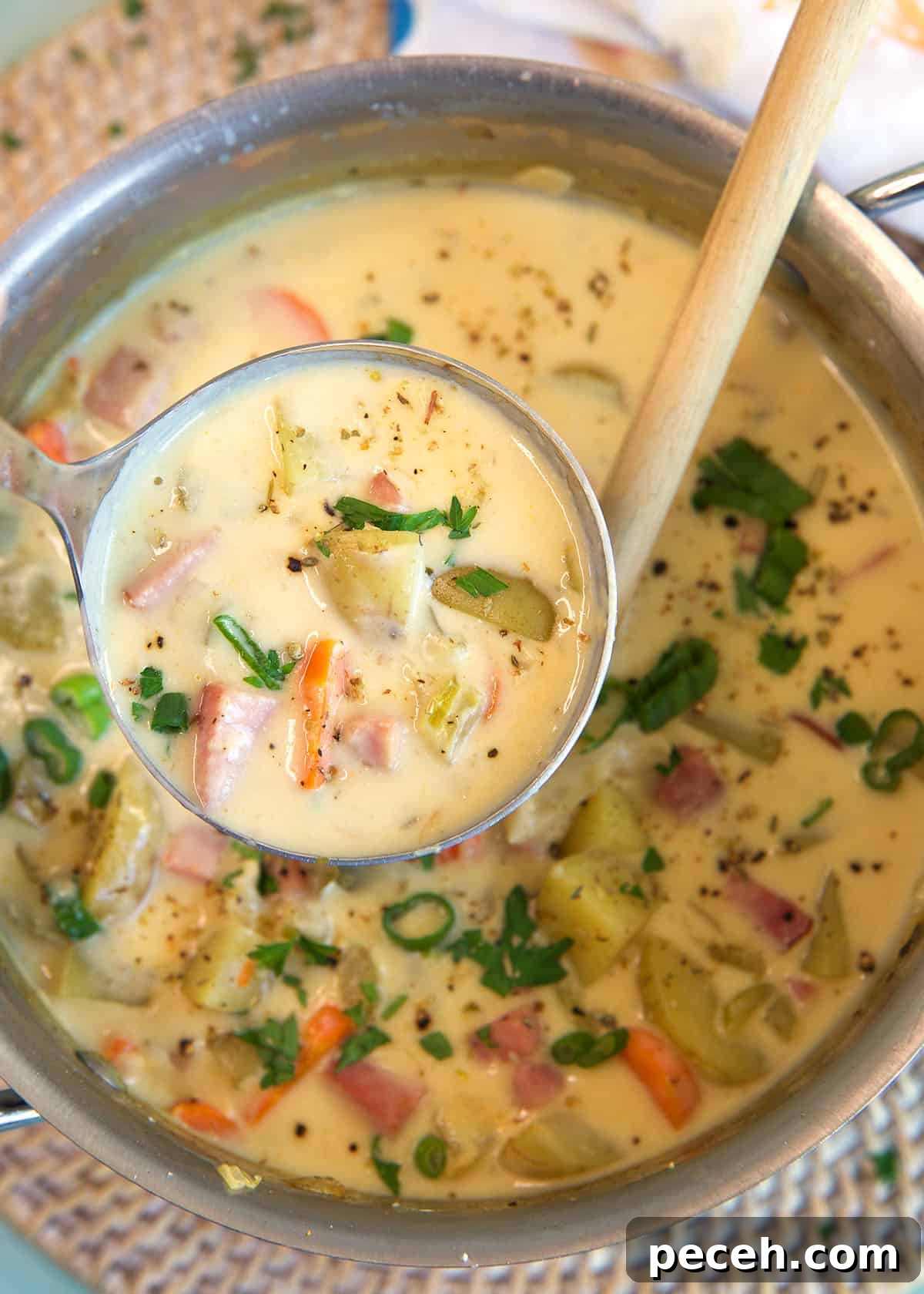 Leftover Ham Recipes: Tasty Ideas for Simple Meals 10 A ladel is lifting a portion of soup from the pot.