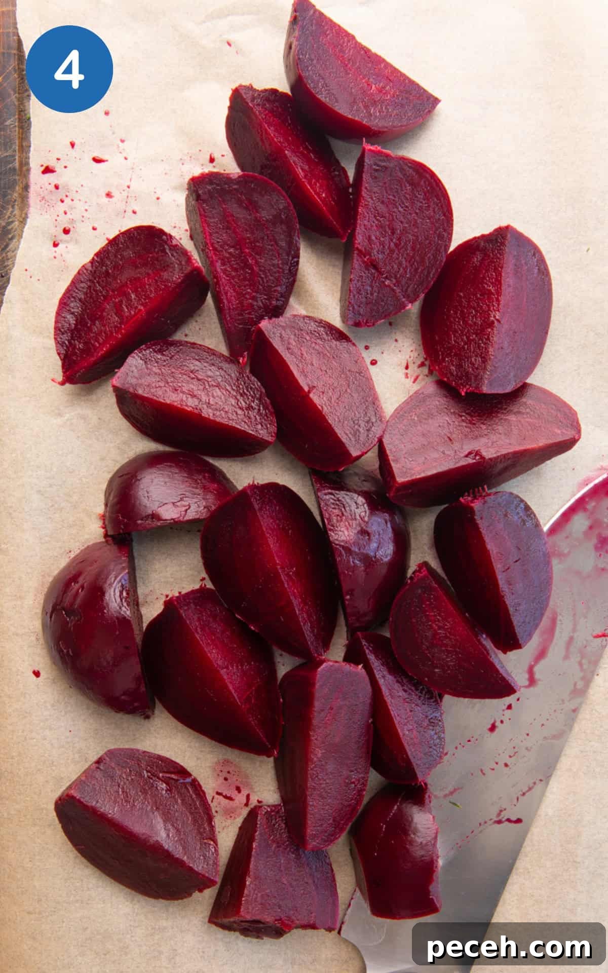 Vibrant Beetroot Salad with Citrus Vinaigrette 7 Sliced quarters of beetroot on a baking sheet.