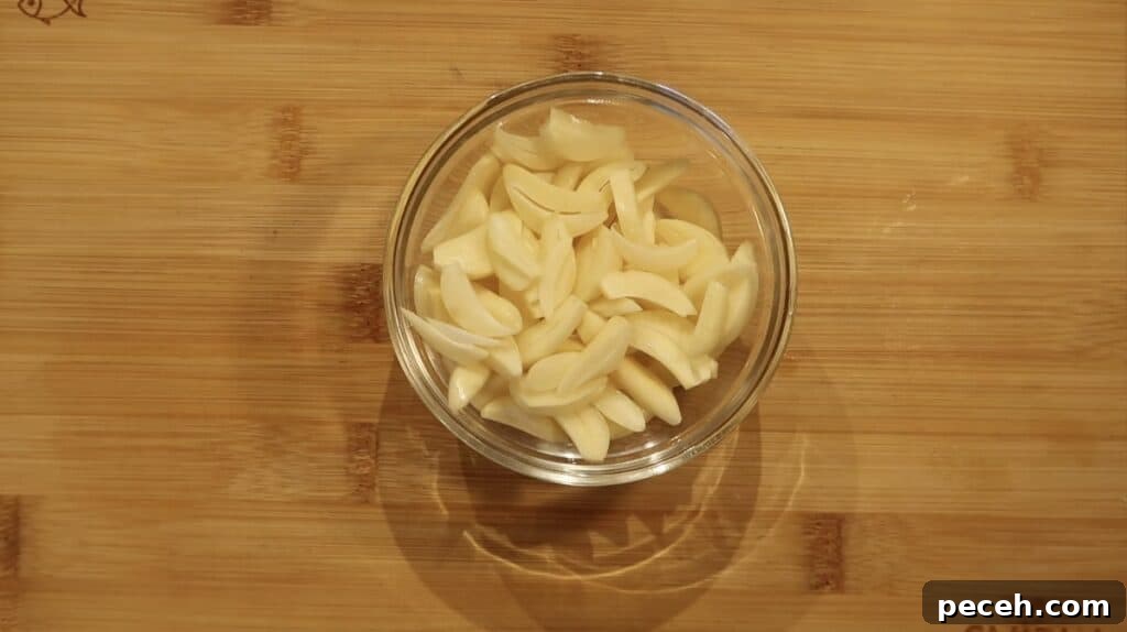Creamy Garlic Chicken Pasta in the Instant Pot 6 garlic sliced into slivers