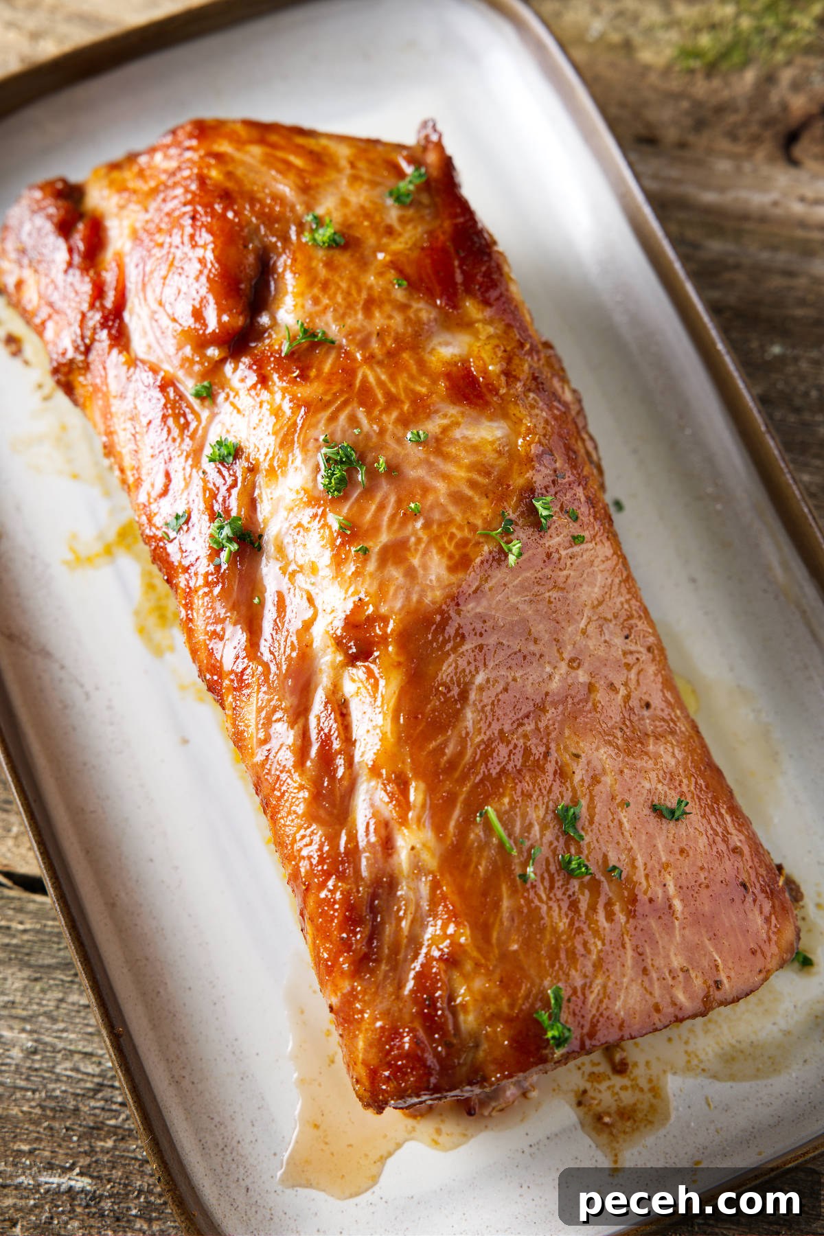Smoked Pork Loin Recipe for Tender, Flavorful Meat 13 whole smoked pork loin resting on plate