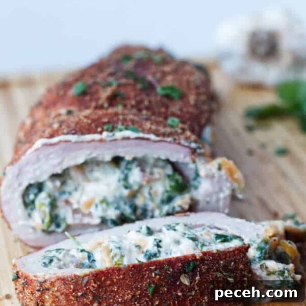Smoked Pork Loin Recipe for Tender, Flavorful Meat 15 sliced stuffed pork tenderloin with cajun rub and twine holding it together