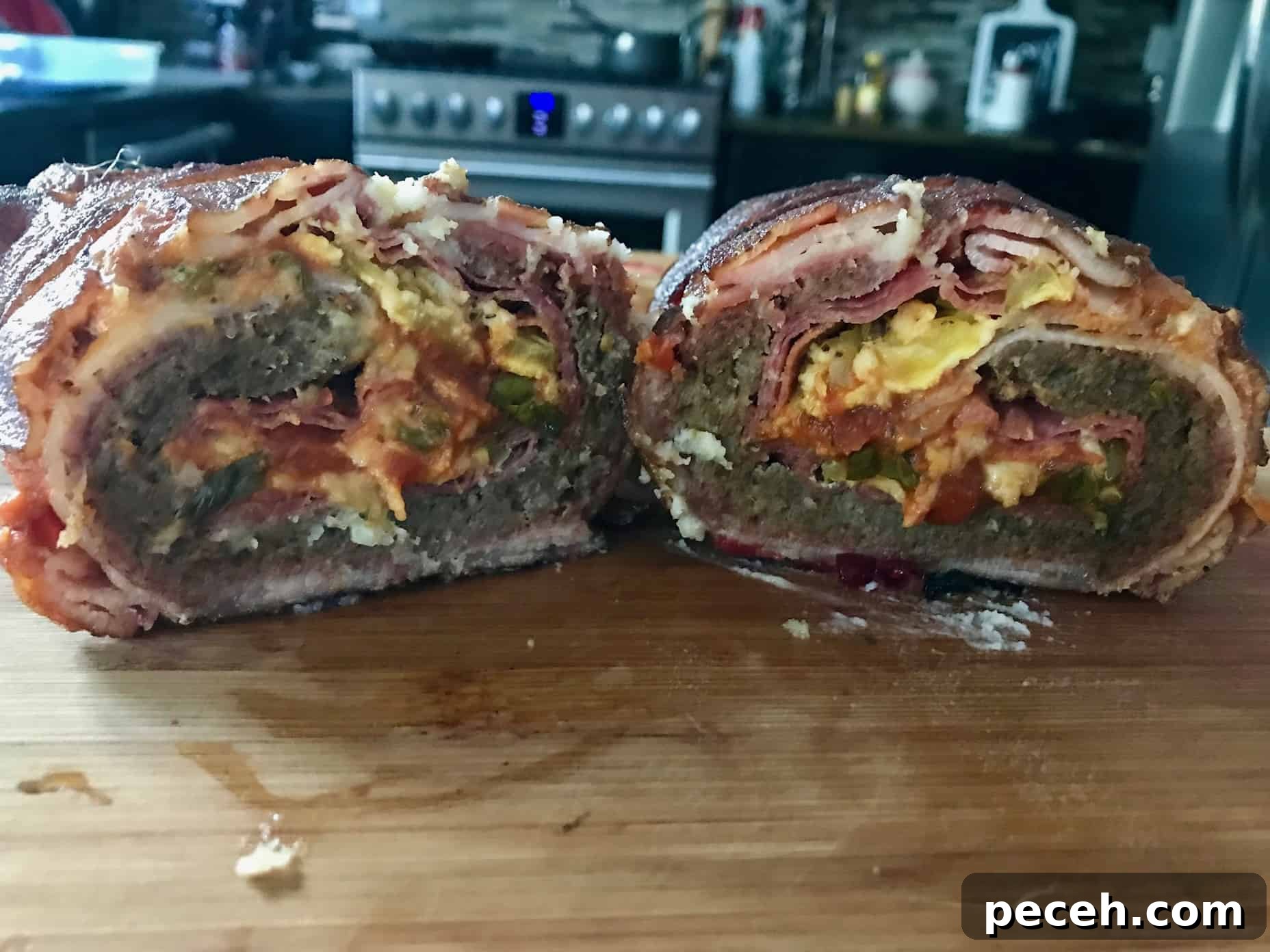 Bacon Explosion Pizza Roll: The Original Pizza Fatty Recipe 9 Pizza Bacon Explosion sliced in half to see pizza ingredients in side close up view